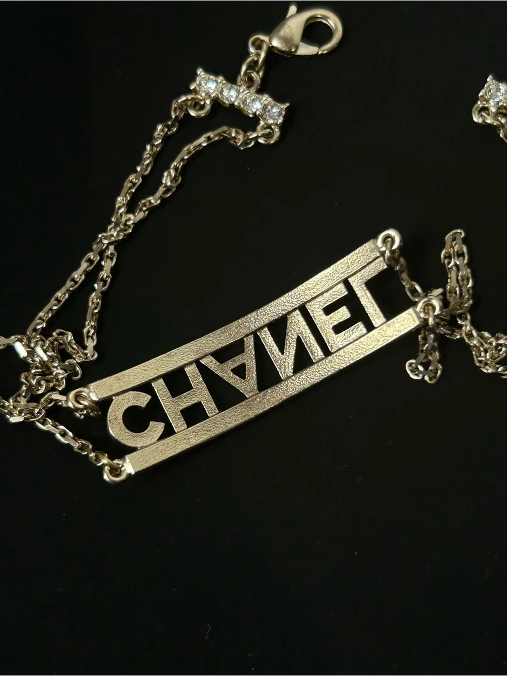 CHANEL logo pendant